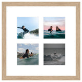 Collage of four surfing photos in a light wood frame with white matting.