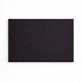 Black rectangular mat on a white background
