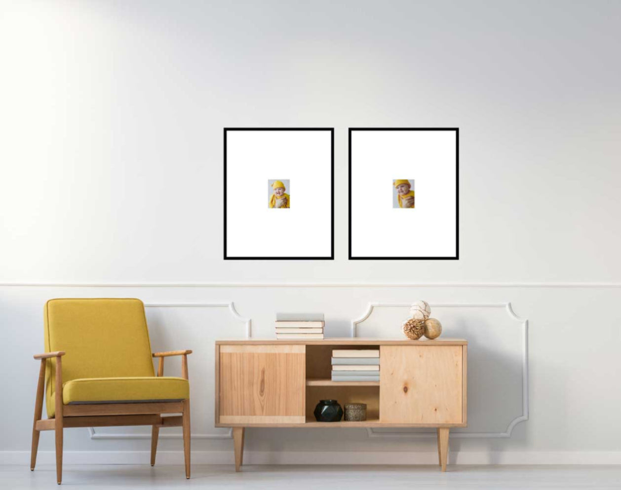 Modern living room with a yellow armchair, wooden console, and two framed pictures on the wall